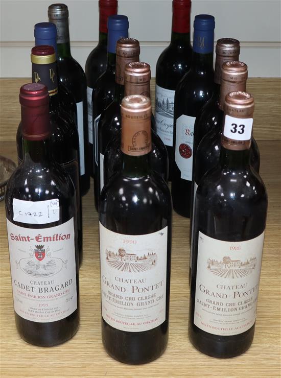 Fourteen bottles of St Emilion red wine, mixed vineyards and years